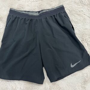 Nike Black and Gray Performance Shorts with Swoosh Trim